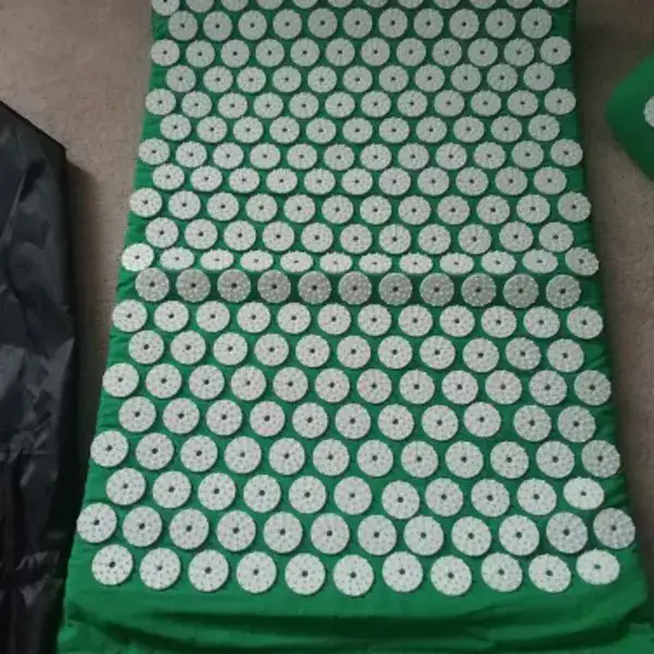 SpikeRest acupressure mat in Green, photographed by a verified buyer in Canada